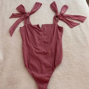 Free People pink bodysuit